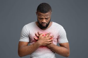 sad-young-man-suffering-from-acute-pain-chest-scaled.jpg